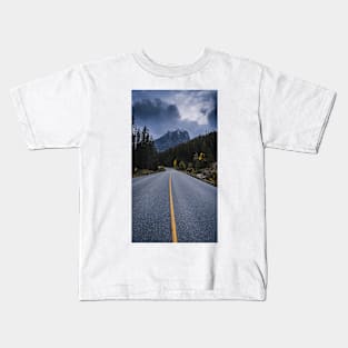 Driving towards the mountains Kids T-Shirt